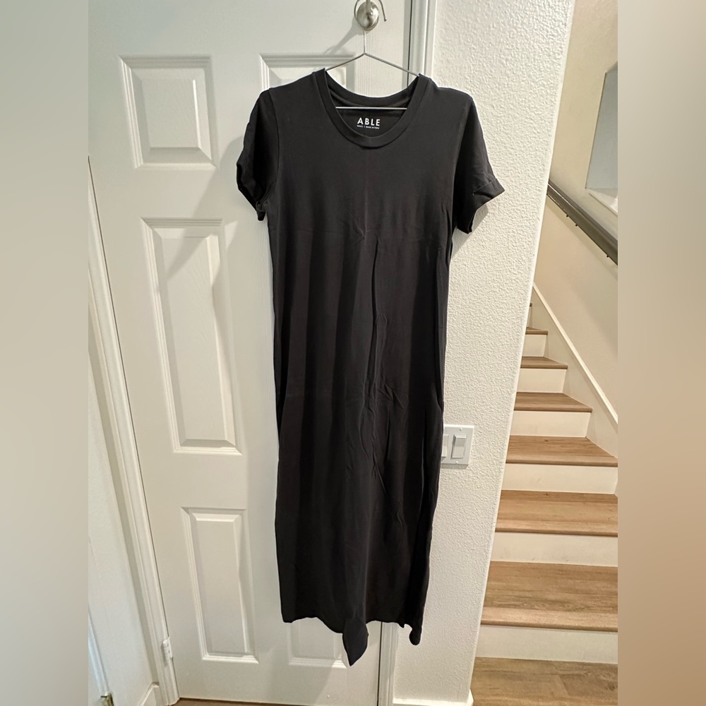 ABLE S black t-shirt maxi dress with side slits.
